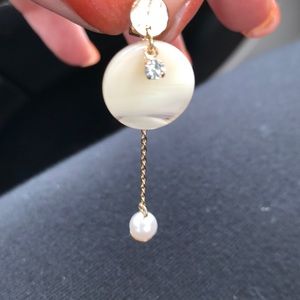 Dangling pearl earrings
